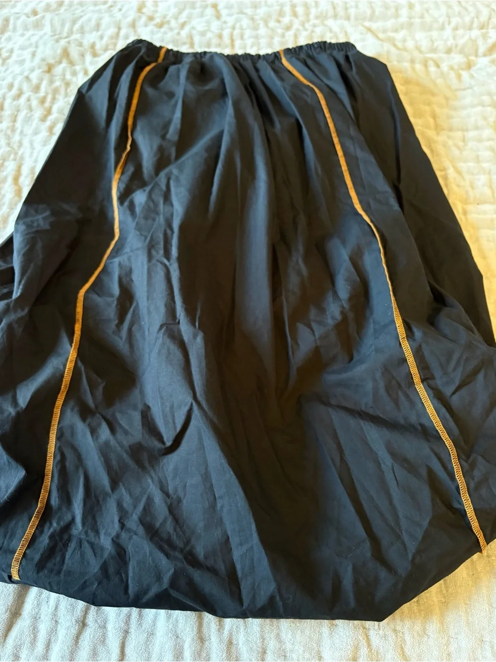 BASERANGE The Turn Skirt In Black Organic Cotton Contrast Stitch Twisted Seams
